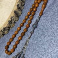 Osmanlı Katalin Tesbih 10x13 mm – Süt Kahve Tonlarında Damarlı, Alpaka Püsküllü (Eski Ürün) – Kod: 1013-10 ( ESKİ ÜRÜNDÜR )